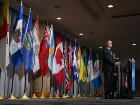 Federal Health Minister Jean-Yves Duclos listens to a question during a news conference without his provincial counterparts after the second of two days of meetings, in Vancouver, on Tuesday, November 8, 2022.