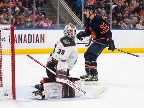 Arizona Coyotes goalie Connor Ingram (39) is scored on by Edmonton Oilers' Ryan Nugent-Hopkins (93) during second period NHL action in Edmonton on Wednesday, December 7, 2022.THE CANADIAN PRESS/Jason Franson