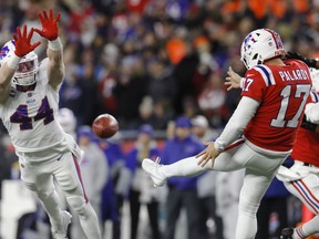 Buffalo Bills linebacker Tyler Matakevich (44) nearly block a punt by New England Patriots' Michael Palardy during the first half of an NFL football game, Thursday, Dec. 1, 2022, in Foxborough, Mass.