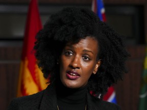 Ketty Nivyabandi, Secretary General of Amnesty International Canada, speaks during a press conference on Parliament Hill in Ottawa, Wednesday, Sept. 28, 2022.