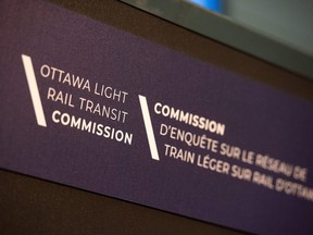 The Ottawa Light Rail Transit (LRT) Commission logo is seen in Ottawa, Wednesday, Nov. 30, 2022. The final light rail transit report is leaving residents frustrated and itching for those involved to own up to their actions.