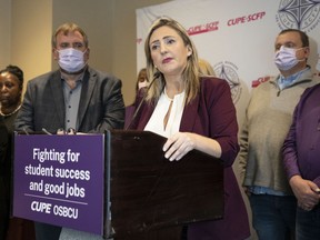Laura Walton, the president of CUPE's Ontario School Board Council of Unions, speaks to the media in Toronto, Wednesday, Nov. 16, 2022. The union representing roughly 55,000 Ontario education workers will announce today the results of a ratification vote on a tentative deal it struck with the province.