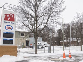 A gas station is shown without power in Montreal, Saturday, Dec. 24, 2022, following a winter storm in the region. Hydro-Québec says more than 10,700 of its customers are still without power a week after a major winter storm brought snow and wind that knocked out power lines in much of Quebec.