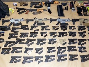 Gun control the right way: Some of the 62 illegal firearms — most smuggled into Canada from the U.S. — seized by police in Project Barbell.