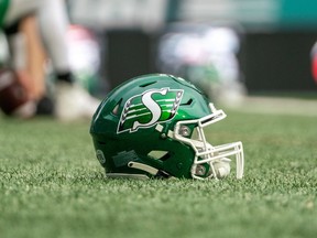 A football helmet sits on the field before CFL football action with the Hamilton Tiger-Cats playing the Saskatchewan Roughriders in Regina on Saturday, June 11, 2022. Kelly Jeffrey was named the new offensive coordinator of the Saskatchewan Roughriders on Monday.