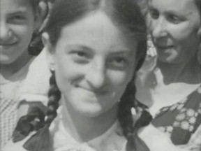 A still image of a village girl from Harry Roher's donated home movie.