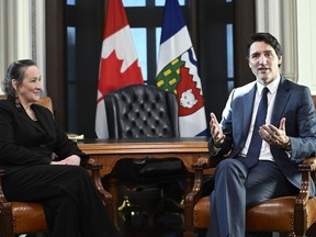 Prime Minister Justin Trudeau meets with Premier of the Northwest Territories Caroline Cochrane in his office in West Block on Parliament Hill in Ottawa, on Friday, Dec. 9, 2022. Trudeau announced this week $800 million in funding over seven years for four large Indigenous-led conservation across Canada.THE CANADIAN PRESS/Justin Tang