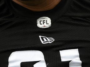 The CFL logo is seen on a jersey during the Redblacks training camp in Ottawa on Thursday, May 19, 2022.