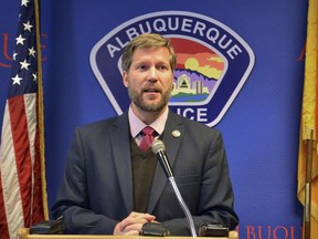FILE - Albuquerque Mayor Tim Keller speaks at a news conference in Albuquerque, N.M., on Wednesday, Jan. 17, 2018. The American Civil Liberties Union of New Mexico and others are suing the city of Albuquerque to stop officials in the state's largest city from destroying homeless encampments and jailing and fining people who are living on the street. The lawsuit filed Monday, Dec. 19, 2022, accuses the city of violating the civil rights of what advocates describe as Albuquerque's most vulnerable population. Keller's office did not immediately respond to a message seeking comment on the lawsuit.
