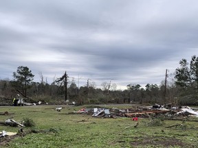 Damage to a home is seen in Keithville, La., Wednesday, Dec. 14, 2022, after a tornado touched down Tuesday, Dec. 13.