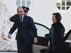 Micheal Martin arrives at Aras an Uachtarain in Dublin, Ireland, Saturday Dec. 17, 2022, to tender his resignation as Prime Minister to President of Ireland Michael D Higgins. Leo Varadkar takes over as Prime Minister under the terms of a coalition deal struck in 2020.
