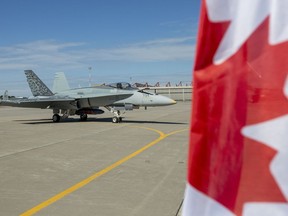 A CF-18 Hornet sits on the tarmac at Canadian Forces Base Trenton, in Trenton, Ont., on Monday June 20, 2022. Canada will not send fighter jets to patrol NATO airspace next year, the first time that Canadian CF-18s will be absent from the skies over Europe since 2017.