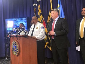 Commissioner Michael Harrison and FBI Baltimore Special Agent In Charge Thomas Sobocinski announce the arrest of six people related to a wave of carjackings and robberies using ride-hailing apps such as Uber and Lyft.