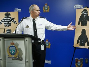 Winnipeg police inspector Shawn Pike provides an update to an ongoing homicide investigation in Winnipeg, Thursday, Dec. 1, 2022. It was announced that Jeremy Skibicki faces three more charges of first-degree murder. In addition to Rebecca Contois, who was identified earlier, Skibicki has been charged in the deaths of Morgan Beatrice Harris, Marcedes Myran, and an unidentified female. Pike shows a jacket that may help identify the fourth subject.