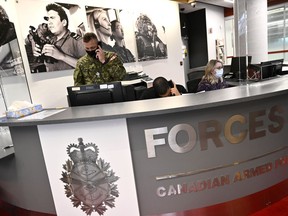 Staff work at a Canadian Armed Forces recruitment centre in Ottawa, on Tuesday, Sept. 20, 2022.