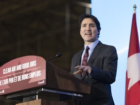 Prime Minister Justin Trudeau speaks at the General Motors CAMI production plant in Ingersoll, Ont., on Monday, December 5, 2022. With cross-border auto tensions now in the rear-view mirror, Prime Minister Justin Trudeau is talking about Canada's next big bilateral challenge: head-to-head economic competition with the United States.THE CANADIAN PRESS/Nicole Osborne