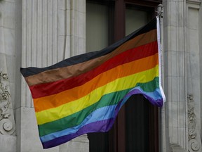 FILE - Philadelphia's altered gay pride flag is seen outside City Hall on June 19, 2017, in Philadelphia. Pennsylvania government regulations would be revised with extensive definitions of sex, religious creed and race under a proposal set for a vote on Thursday, Dec. 8, 2022 -- a change some Republican lawmakers see as an overreach on a subject they think should not be addressed without legislation.
