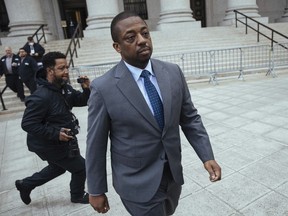 FILE - Former New York Lieutenant Governor Brian Benjamin leaves a hearing in federal court on April 18, 2022, in New York. A judge has thrown out bribery and fraud charges against Benjamin, leaving him facing only records falsification charges, Federal Judge J. Paul Oetken ruled Monday, Dec. 5, 2022. He says prosecutors failed to allege an explicit example in which Benjamin provided a favor for a bribe.