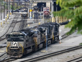 FILE - Norfolk Southern locomotives are moved in the Conway Terminal in Conway, Pa., Thursday, Sept. 15, 2022. On Thursday the Commerce Department issues its third and final estimate of how the U.S. economy performed in the second quarter of 2022. By Matt Ott.