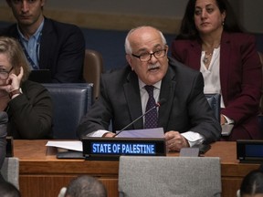 FILE - Palestinian Ambassador Riyad H. Mansour speaks during a meeting of the Special Political and Decolonization Committee at United Nations headquarters on Friday, Nov. 11, 2022. On Friday, Dec. 30, 2022, the U.N. General Assembly asked the U.N.'s highest judicial body to give its opinion on the legality of Israeli policies in the occupied West Bank and east Jerusalem. Mansour thanked countries that backed the measure.