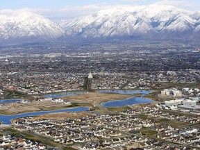 FILE - Homes in suburban Salt Lake City are shown, April 13, 2019. According to estimates released Thursday, Dec. 22, 2022, by the U.S. Census Bureau, the U.S. population grew by 1.2 million people this year, with growth largely driven by international migration, and the nation now has 333.2 million residents.