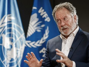 FILE - World Food Program Executive Director David Beasley speaks during an interview with The Associated Press at the WFP headquarters in Rome, Nov. 2, 2021. Beasley announced Saturday, Dec. 17, 2022, that he will step down from his role as executive director of the U.N. World Food Program, ending a six-year term heading the world's largest humanitarian organization.