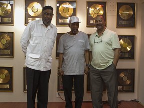 FILE - Musicians Kenneth Gamble, left, Leon Huff, center, and Thom Bell stand together at Gamble and Huff Music, on Broad Street, in Philadelphia, on Thursday, May 30, 2013. Bell, the Grammy-winning producer, writer and arranger who helped perfect the "Sound of Philadelphia" of the 1970s with the inventive, orchestral settings of such hits as the Spinners' "I'll Be Around" and the Stylistics' "Betcha by Golly, Wow," has died at age 79. Bell's wife, Vanessa Bell, said that he died Thursday, Dec. 22, 2022 at his home in Bellingham, Washington, after a lengthy illness.
