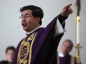 FILE - Frank Pavone, head of Priests for Life, gives the Homily during a mass at Ave Maria University's Oratory in Naples, Fla., on March 31, 2009 to recognize the fourth anniversary of Terri Schiavo's death. The Vatican has defrocked an anti-abortion U.S. priest, Frank Pavone, for what it said were "blasphemous communications on social media" as well as "persistent disobedience" of his bishop. A letter to U.S. bishops from the Vatican ambassador to the U.S., Archbishop Christophe Pierre, obtained Sunday Dec. 18, 2022, said the decision against Pavone, who heads the anti-abortion group Priests for Life, had been taken Nov. 9, and that there was no chance for an appeal.