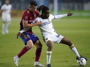 Real Salt Lake defender Aaron Herrera (22) defends against LA Galaxy forward Raheem Edwards (44) during the first half of an MLS soccer match in Carson, Calif., Saturday, Oct. 1, 2022. Herrera was acquired by CF Montreal in trade with Real Salt Lake on Wednesday.