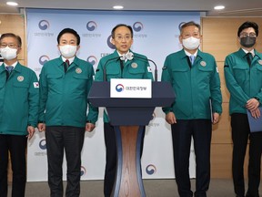 South Korean Finance Minister Choo Kyung-ho, center, speaks during a news conference at the government complex in Seoul, South Korea, Thursday, Dec. 8, 2022. South Korea's government expanded its back-to-work orders Thursday against thousands of cargo truck drivers who are staging a nationwide walkout over freight fare issues, saying a prolonged strike could inflict "deep scars" on the country's economy.