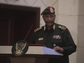 Sudan's Army chief Gen. Abdel-Fattah Burhan speaks following the signature of an initial deal aimed at ending a deep crisis caused by last year's military coup, in Khartoum, Sudan, Monday, Dec. 5, 2022. Sudan's coup leaders and the main pro-democracy group have signed a deal to establish a civilian-led transitional government following the military takeover last year. But key players refused to participate, and no deadline was set for the transition to begin.