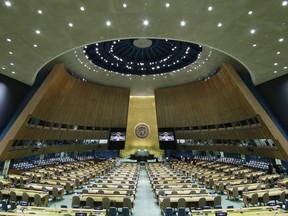 FILE - The United Nations General Assembly Hall sits empty before the start of the 76th Session of the General Assembly at U.N. headquarters on Sept. 20, 2021, in New York. A key U.N. committee has again blocked Myanmar's military junta from taking the country's seat at the United Nations, two well-informed U.N. diplomats said Wednesday, Dec. 14, 2022.