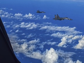 FILE - In this photo released by Xinhua News Agency, fighter jets of the Eastern Theater Command of the Chinese People's Liberation Army (PLA) conduct a joint combat training exercises around the Taiwan Island on Aug. 7, 2022. China blasted an annual U.S. defense spending bill for hyping up the "China threat" while Taiwan welcomed the legislation, saying it demonstrated U.S. support for the self-governing island that China says must come under its rule. "China deplores and firmly opposes this U.S. move," the Foreign Ministry said in a statement posted online Saturday, Dec. 24.
