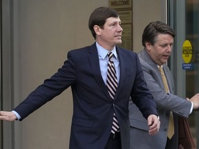 Former Republican state Sen. Brian Kelsey, left, leaves federal court Tuesday, Nov. 22, 2022, in Nashville, Tenn. Kelsey changed an earlier plea of not guilty to guilty Tuesday, on charges of violating federal campaign finance laws.