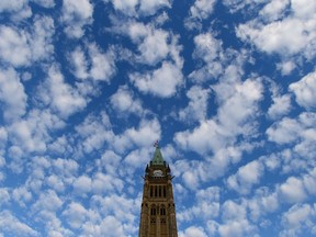 The Peace Tower is seen on Parliament Hill in Ottawa on Nov. 5, 2013. Canada's climate adaptation strategy is underfunded and does not clearly lay out how its targets align with the country's top climate change risks, a new report says.