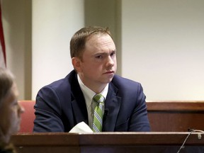 Defendant Aaron Dean takes the stand to testify on Monday, Dec. 12, 2022, during his trial for the murder of Atatiana Jefferson in Fort Worth, Texas. Dean, a former Fort Worth police officer, is accused of fatally shooting Jefferson in 2019, during an open structure call.