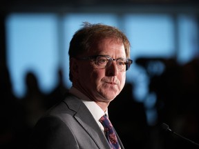 B.C. Health Minister Adrian Dix pauses while responding to questions during a news conference with his provincial counterparts after the first of two days of meetings, in Vancouver, on Monday, November 7, 2022.
