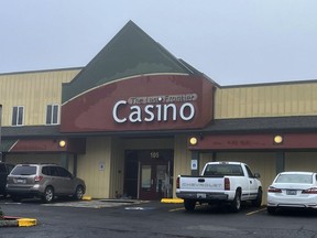 The Last Frontier Casino is seen in La Center, Wash., Tuesday, Dec. 13, 2022. Four people were stabbed or slashed at a casino in Washington state in what witnesses described as a random, unprovoked attack late Monday night, the Clark County Sheriff's Office said. A suspect in the case was arrested early Tuesday, and all four victims were expected to survive.
