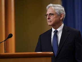 FILE - Attorney General Merrick Garland listens to a question as he leaves the podium after speaking at the Justice Department, Aug. 11, 2022, in Washington. Garland is moving to end sentencing disparities that have imposed harsher penalties for different forms of cocaine and worsened racial inequity in the U.S. justice system.