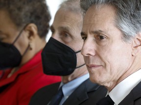 Secretary of State Antony Blinken, from right, Dr. Anthony Fauci, Director of the National Institute of Allergy and Infectious Diseases, and Rep. Barbara Lee, D-Calif., attend a World AIDS Day event hosted by the Business Council for International Understanding in Washington, Friday, Dec. 2, 2022.