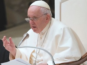 Pope Francis attends his weekly general audience in the Paul VI Hall at The Vatican, Wednesday, Dec. 14, 2022.