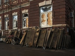 Stretchers are seen outside a city hospital, where wounded Ukrainian soldiers are brought for treatment, in Bakhmut, the site of heavy battles with Russian troops, in the Donetsk region, Ukraine, Friday, Dec. 9, 2022.