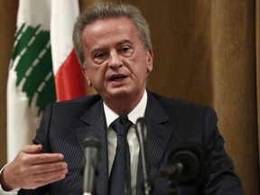 FILE - Riad Salameh, the governor of Lebanon's Central Bank, speaks during a press conference, in Beirut, Lebanon, Nov. 11, 2019. A Lebanese judge has put under arrest an actress who has links to the country's central bank governor after she showed up for questioning on Friday, Dec. 9, 2022, judicial officials and state-run National News Agency said.