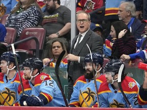 Florida Panthers head coach Paul Maurice watches during the first period of an NHL hockey game against the New York Rangers, Sunday, Jan. 1, 2023, in Sunrise, Fla.