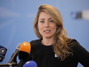 Canada's Foreign Minister Melanie Joly arrives for the first day of the meeting of NATO Ministers of Foreign Affairs in Bucharest, Romania, Tuesday, Nov. 29, 2022.&ampnbsp;The federal government says Canada will help guide a peace process aimed at resolving the ongoing crisis in Cameroon where years of fighting and strife have displaced nearly 800,000 people.