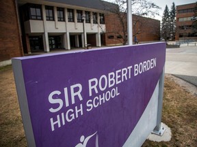 Two students charged with hate crimes in swastika incident at Sir Robert Borden High school.