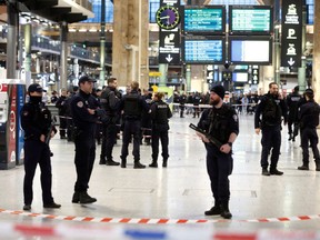 French police secure the area after a man with a knife wounded several people at the Gare du Nord train station in Paris, France, January 11, 2023.
