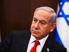Israeli Prime Minister Benjamin Netanyahu convenes a weekly cabinet meeting at the Prime Minister's office in Jerusalem, January 8, 2023.