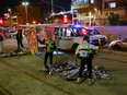 Israeli authorities work at the scene of a terrorist attack in Jerusalem on Jan. 27.