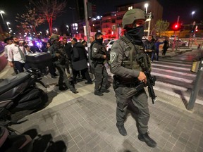 Israeli security forces deploy at the site of a attack in East Jerusalem, on January 27, 2023.
